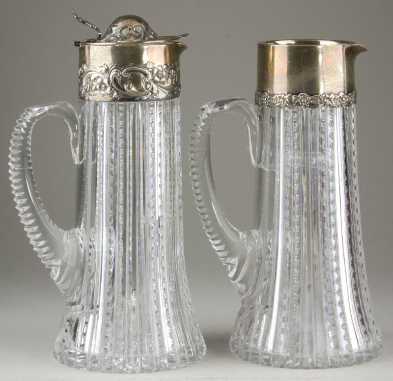 Appraisal: Two Dominick Haff Sterling Mounted Wine Jugs both with floral