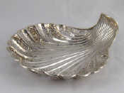 Appraisal: A large late Victorian pierced silver shell dish Sheffield x