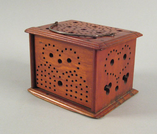 Appraisal: Pennsylvania cherry foot warmer th c with steel bail handle