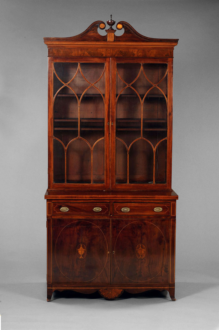 Appraisal: BALTIMORE FEDERAL INLAID MAHOGANY BOOKCASE-CABINET The molded swan's neck pediment