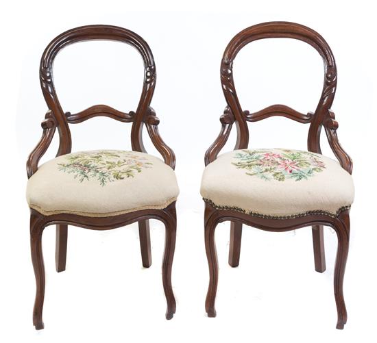 Appraisal: Sale Lot A Pair of Victorian Walnut Balloon Back Chairs