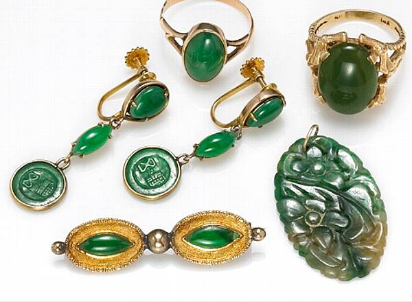 Appraisal: A collection of jade and k gold jewelry including two