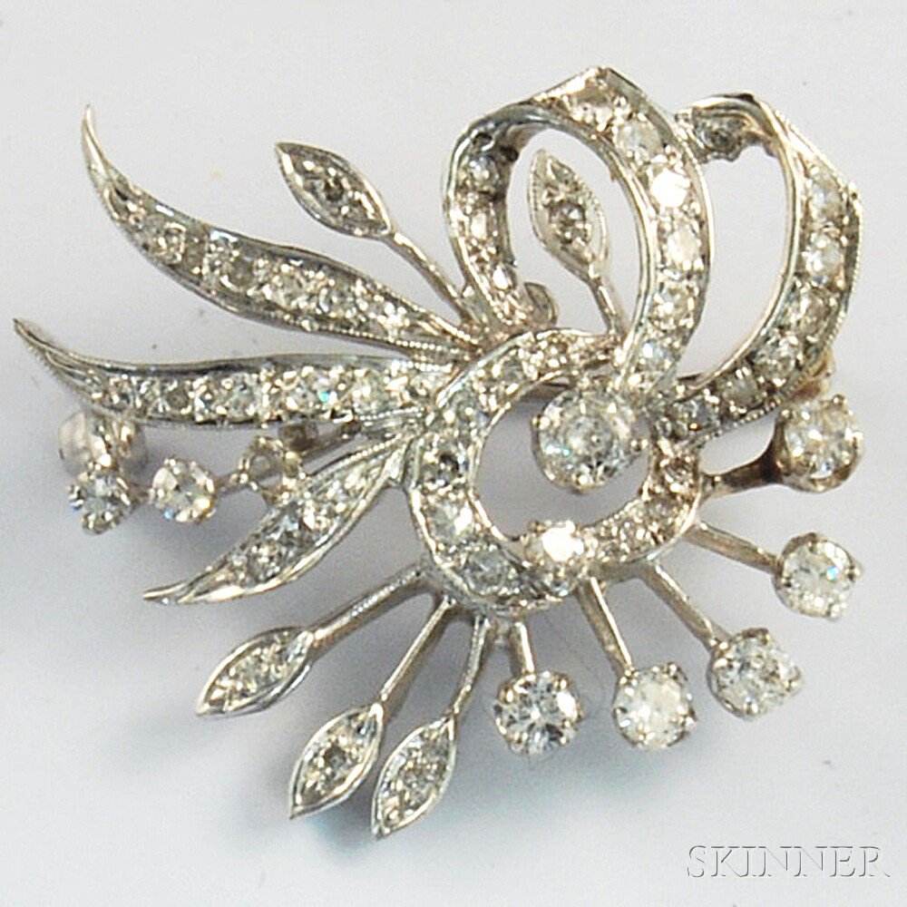 Appraisal: White Gold and Diamond Spray Brooch missing one stone wd