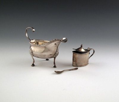 Appraisal: A George III silver sauce boat by Samuel Meriton London