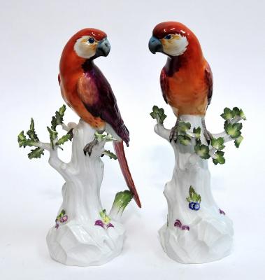 Appraisal: A PAIR OF MEISSEN PORCELAIN PARROTS painted in reds and