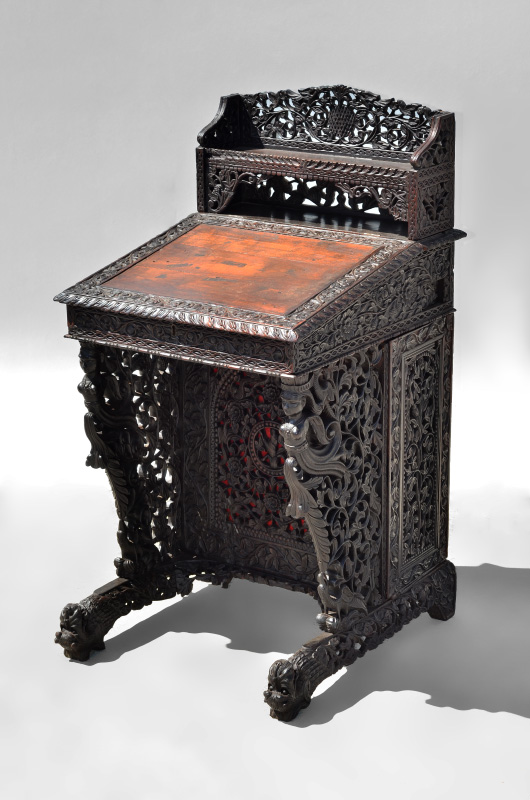 Appraisal: PROFUSELY CARVED ANGLO-INDIAN DAVENPORT DESK Circa 's pierced carved all