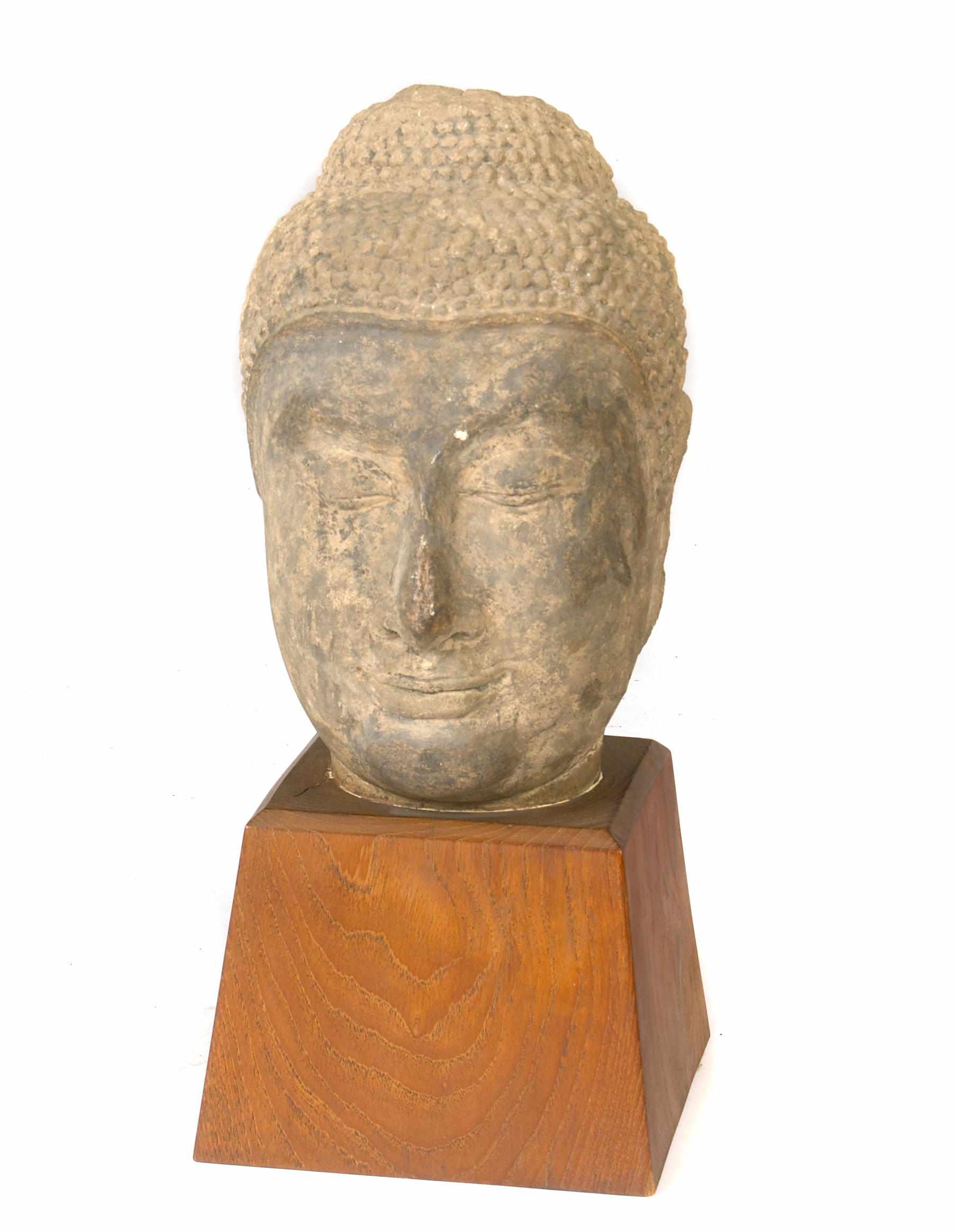 Appraisal: A Chinese stone head of Buddha height in