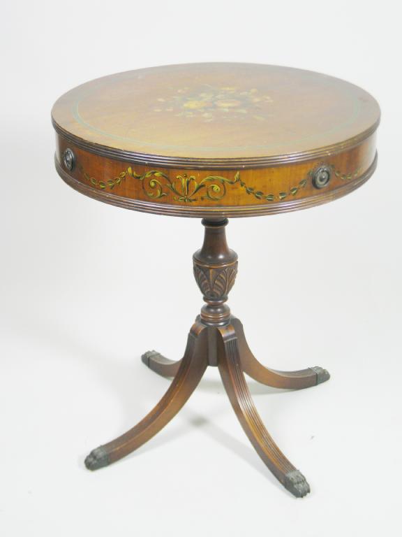 Appraisal: A Sheraton style painted Occasional Table with flowers and scrolls