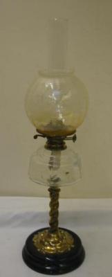 Appraisal: A VICTORIAN BRASS OIL LAMP with clear glass reservoir and