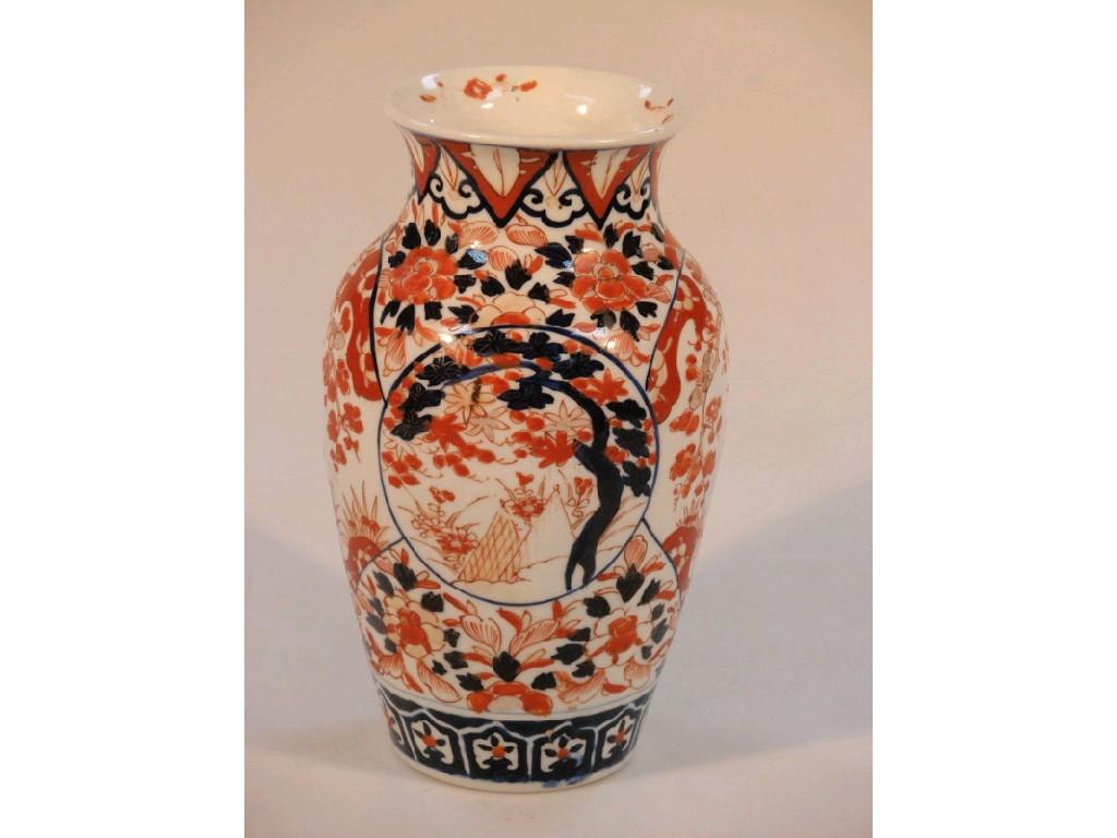 Appraisal: An Imari ovoid vase with hand painted traditional flowering branch