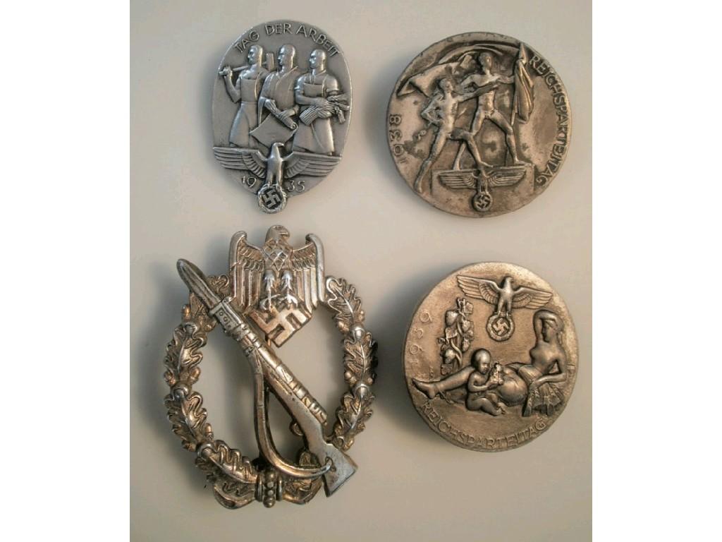 Appraisal: German infantry assault badge and three Nazi alloy pin badges