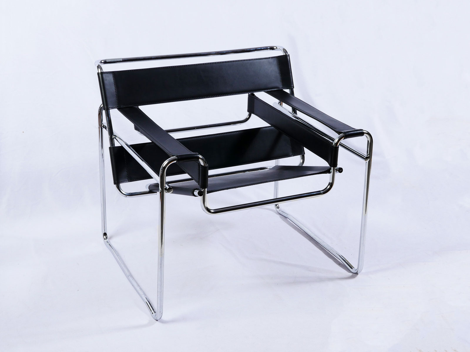 Appraisal: ITALIAN WASSILY STYLE BLACK LEATHER CHROME CHAIR Italian Black leather