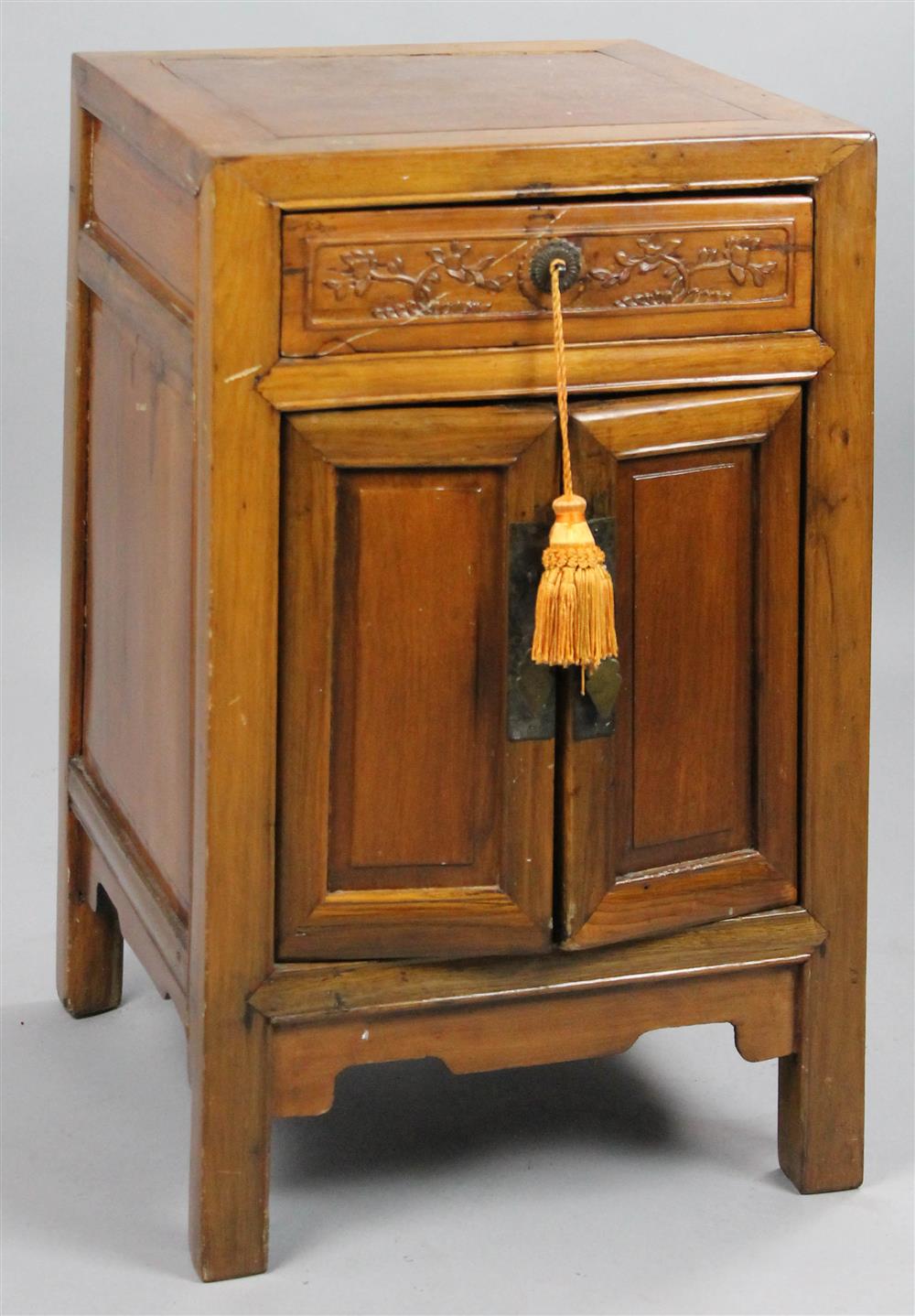 Appraisal: CHINESE CARVED SIDE CABINET the square top over a single