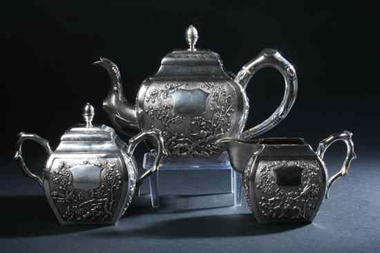 Appraisal: CHINESE SILVER THREE-PIECE TEA SET circa - maker's mark Luen