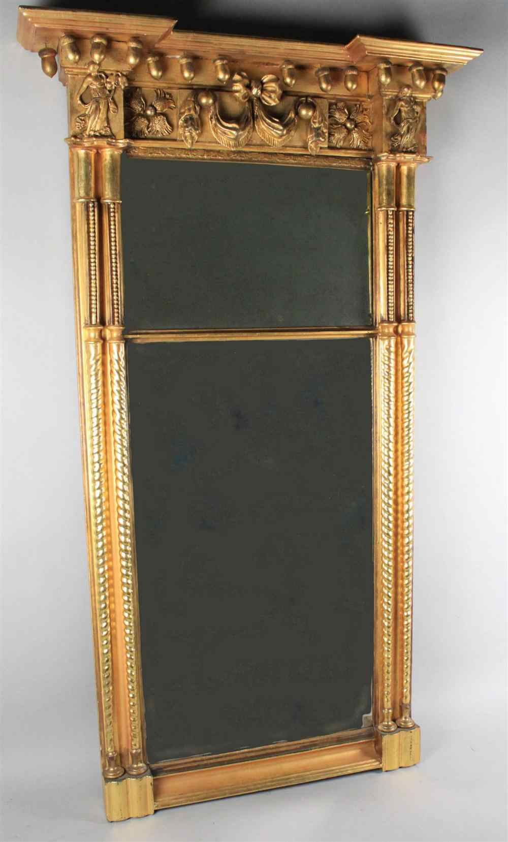 Appraisal: AMERICAN NEOCLASSICAL GILTWOOD MIRROR circa early th century the well