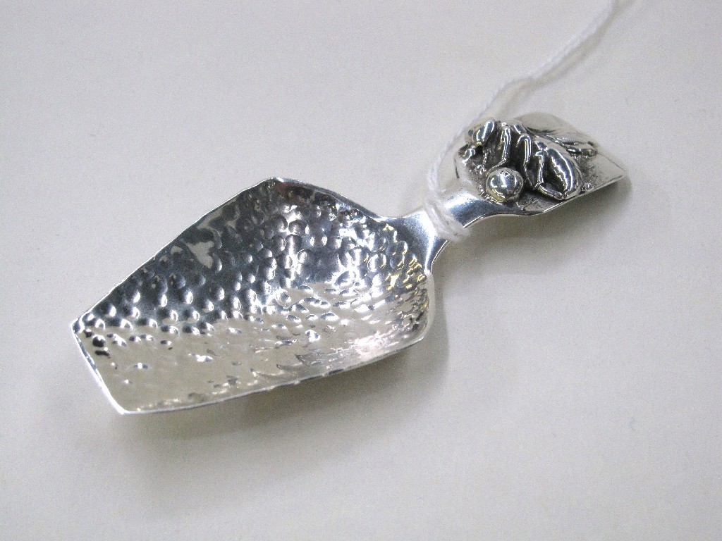 Appraisal: Irish silver caddy spoon the handle embossed with a winged