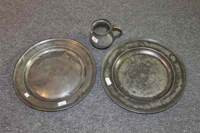 Appraisal: TWO GEORGIAN PEWTER CHARGERS with reeded borders one marked 'Holy