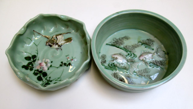 Appraisal: ORIENTAL CELADON GLAZED BOWL AND ASHTRAY the bowl featuring swimming