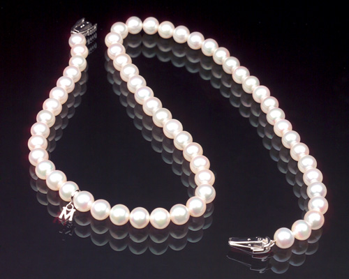 Appraisal: MIKIMOTO Akoya cultured pearl necklace of spherical pearls and an