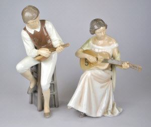 Appraisal: A pair of Bing Grondahl figures - seated man playing