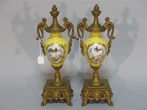 Appraisal: YELLOW PORCELAIN AND ORMOLU DECORATIVE URNS