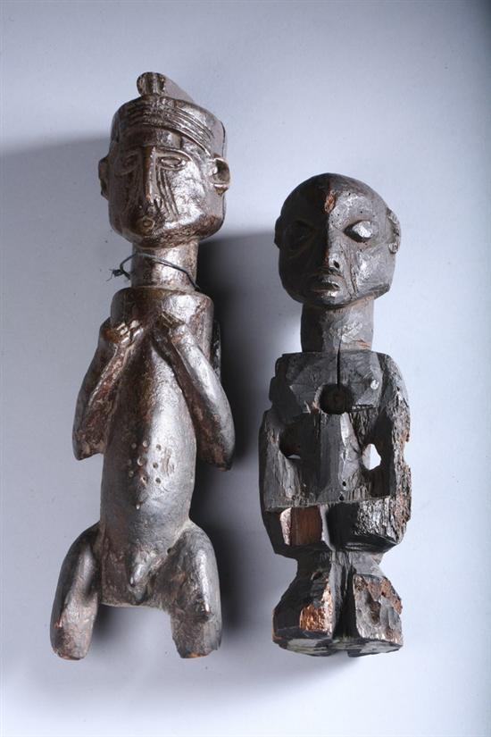 Appraisal: TWO AFRICAN WOOD FIGURES OF MEN - Larger in long