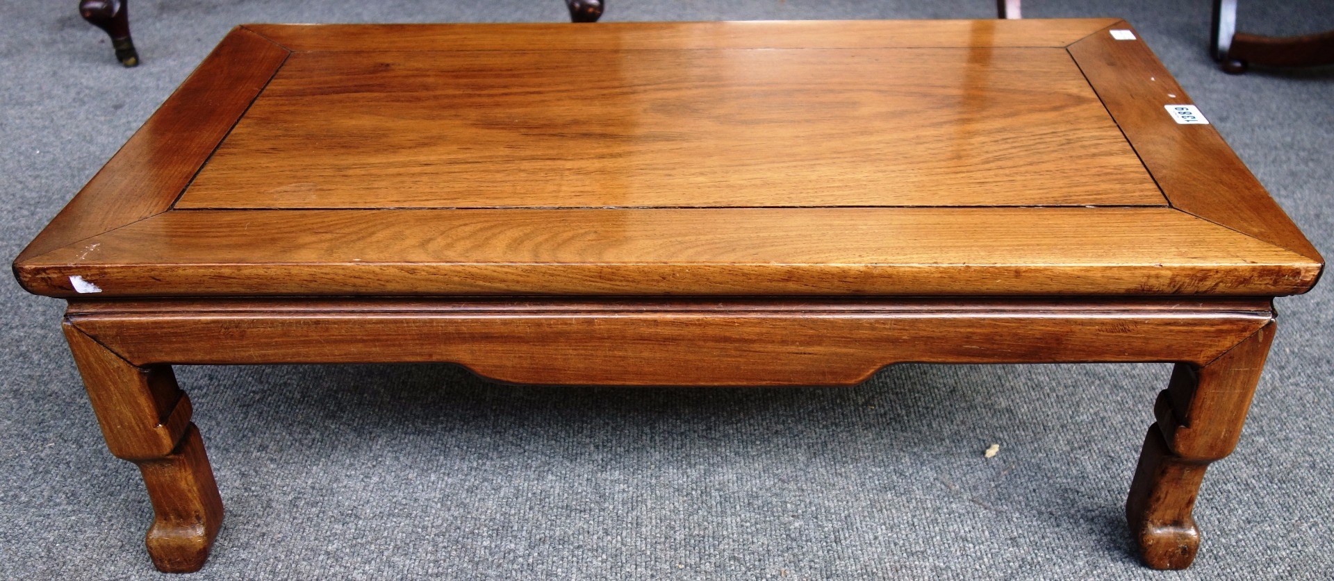 Appraisal: An early th century Chinese hardwood low rectangular table on