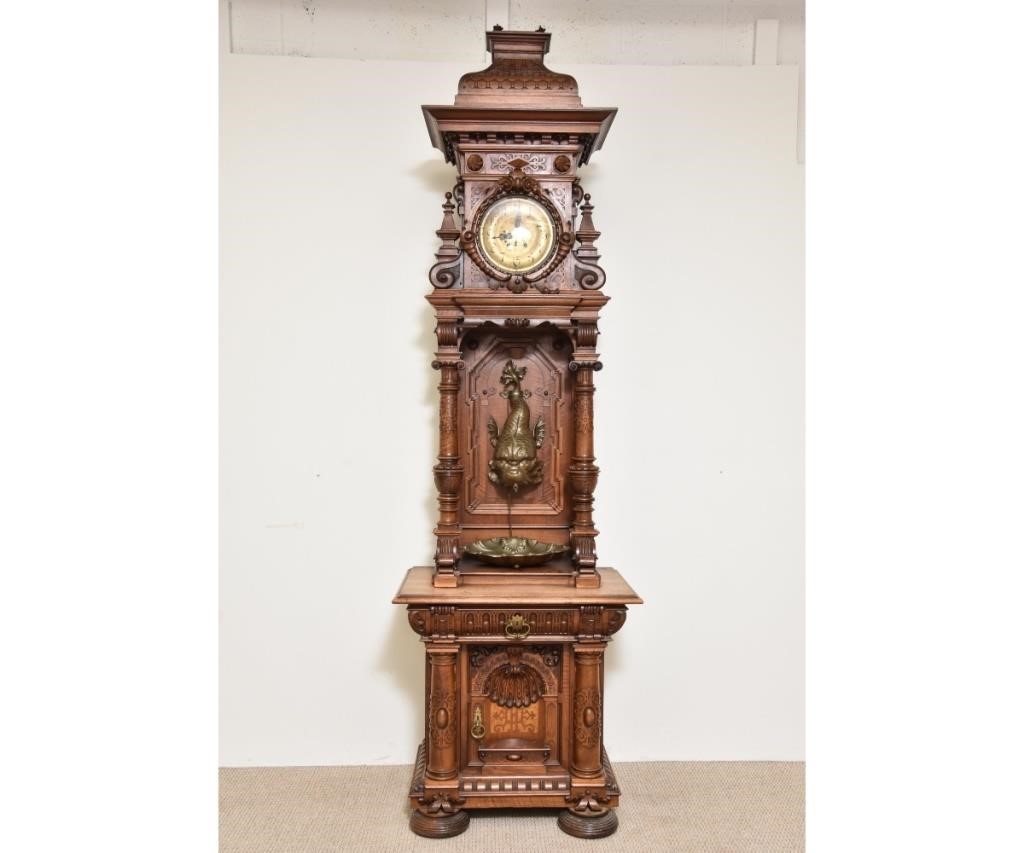 Appraisal: Highly carved Black Forest walnut tall case clock by Lorenz