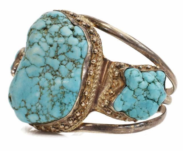 Appraisal: Sterling silver cuff bracelet with three turquoise nuggets on a