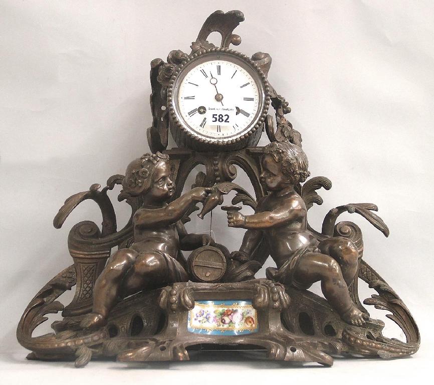 Appraisal: French bronze and spelter two train mantel clock the VIncenti