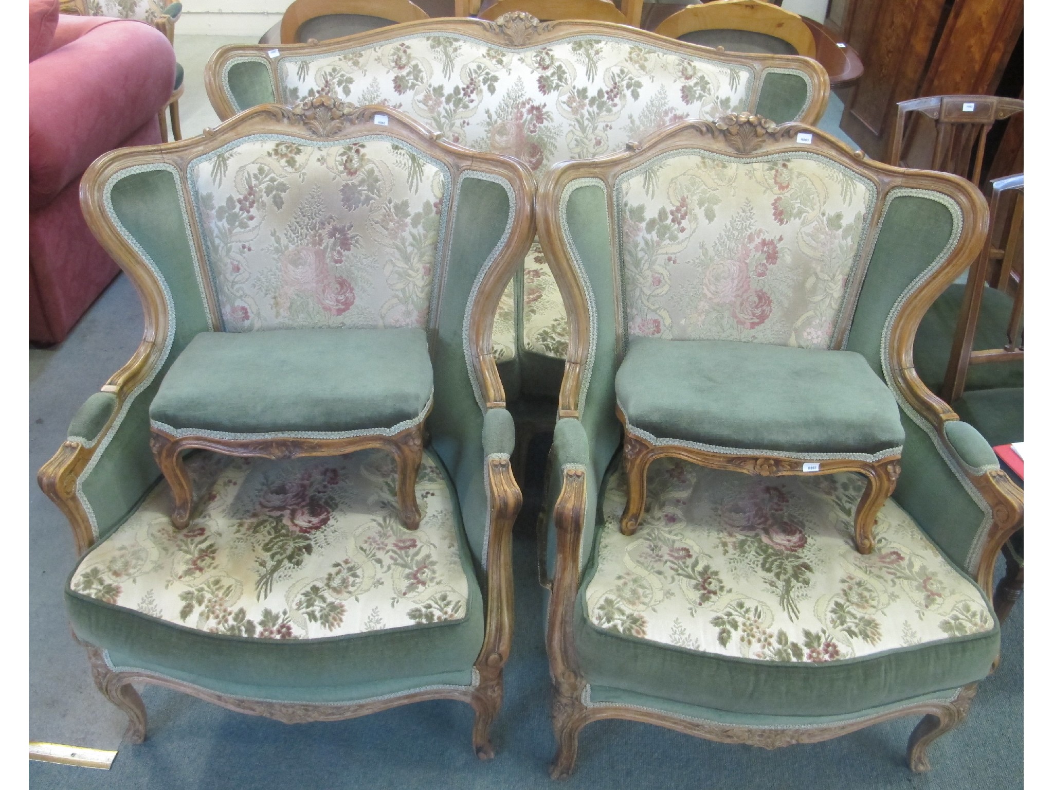 Appraisal: A French beech three piece suite and two foot stools