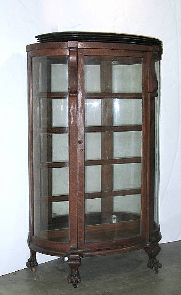 Appraisal: An oak vitrine cabinet first quarter th century height ft