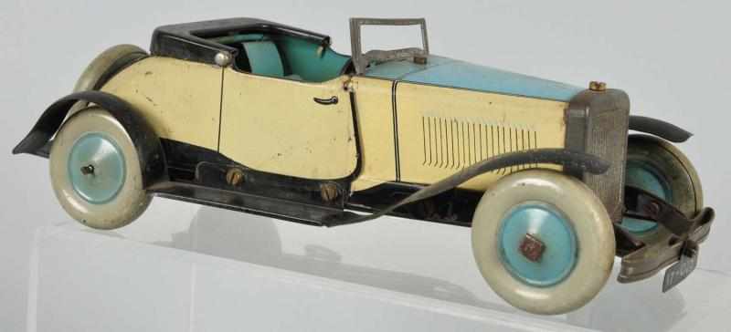 Appraisal: Tin Litho Burnett Roadster Car Wind-Up Toy Description English Working