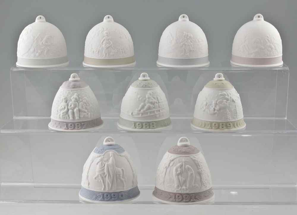 Appraisal: LLADRO PORCELAIN BELL ORNAMENTS Pieces to include Jose Roig designer