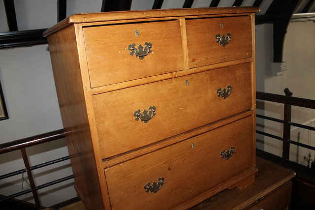 Appraisal: A PINE CHEST OF DRAWERS with two short drawers over