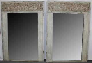 Appraisal: A pair of French painted Baroque mirrors A pair of