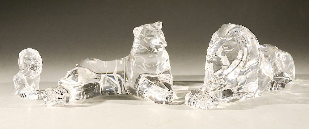 Appraisal: Three Steuben crystal animal figures including glass recumbent lion Noble