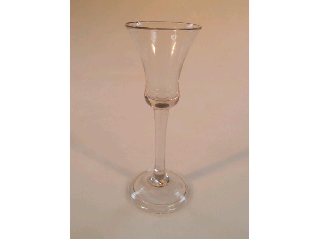 Appraisal: A mid thC wine glass with waisted bowl and drawn