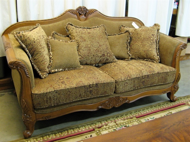 Appraisal: LOUIS XV STYLE SOFA with carved and upholstered hardwood frame