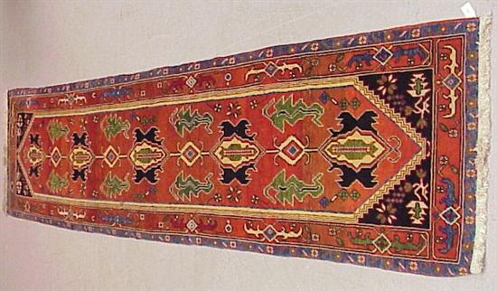 Appraisal: Modern Turkish Heriz-style runner red field with blue border polychrome