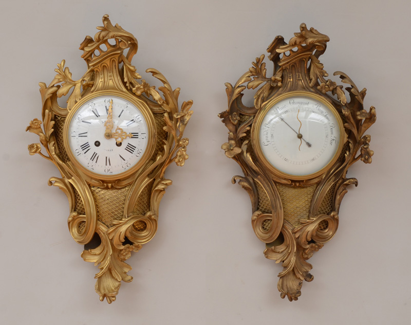 Appraisal: TWO SIMILAR LOUIS XV STYLE GILT-BRONZE SMALL CARTEL CLOCKS The