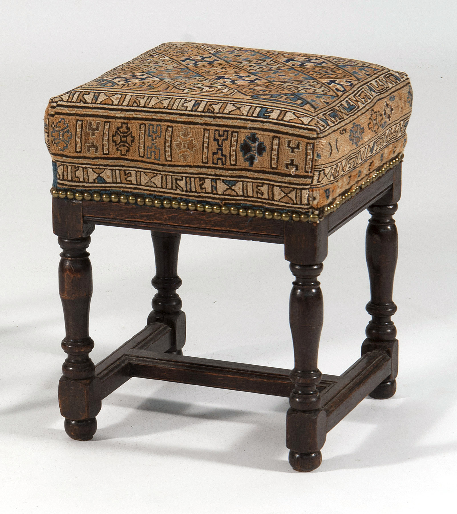 Appraisal: JACOBEAN-STYLE SOUMAC BAGFACE-UPHOLSTERED STOOL th Century and LaterOn oak block