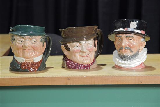 Appraisal: THREE ROYAL DOULTON CHARACTER MUGS ''Beefeater'' '' h ''Sam Weller''