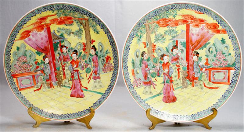 Appraisal: Pr Famille Verte Chinese porcelain chargers courtesans in garden enameled