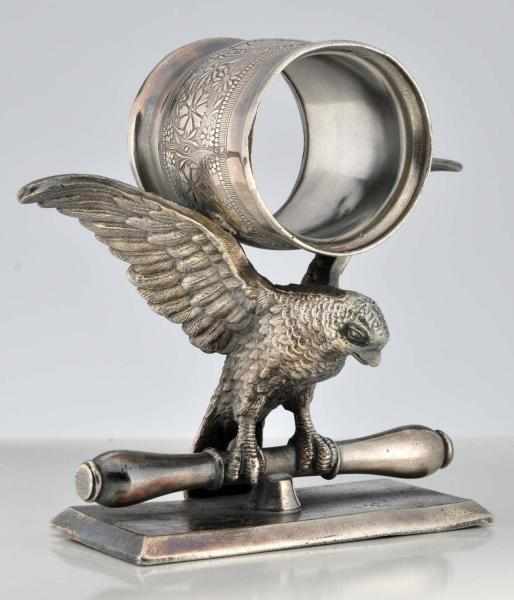 Appraisal: Large Bird Figural Napkin Ring Large bird on knife rest