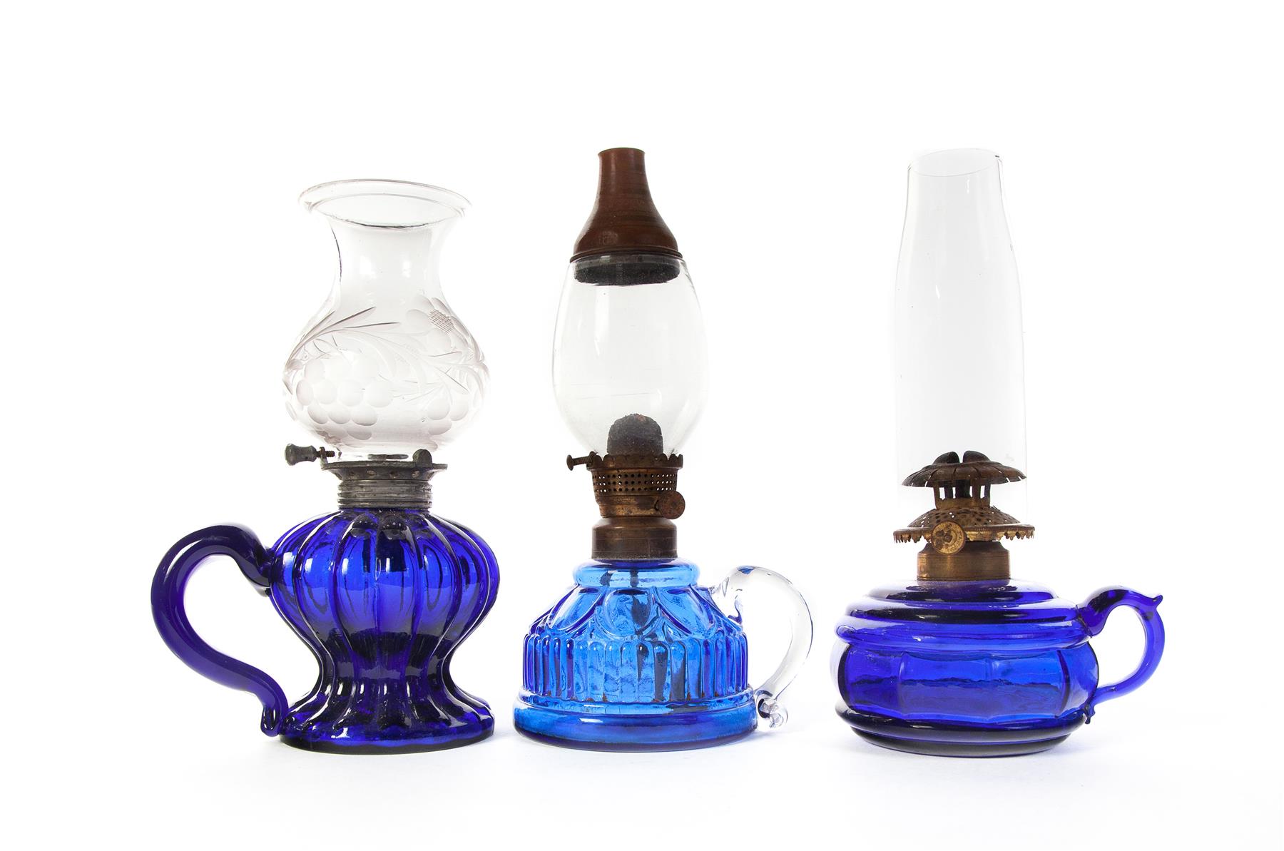 Appraisal: THREE AMERICAN CHAMBER LAMPS Second half- th century Cobalt glass