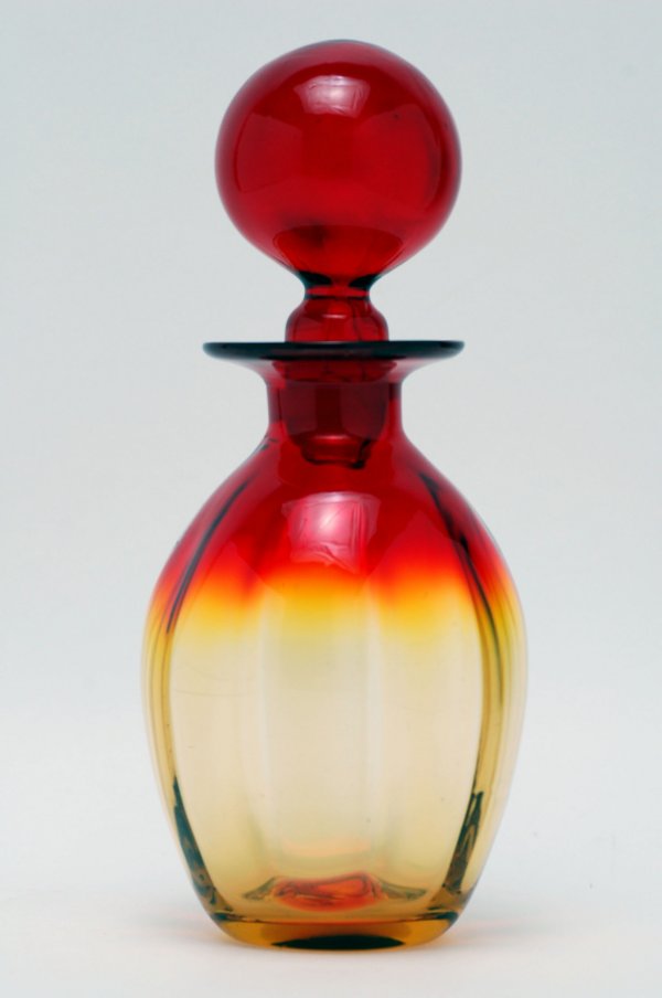 Appraisal: Amberina blown glass paneled cologne with stopper MEASUREMENTS high overall