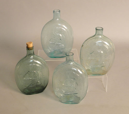 Appraisal: Four aqua blown glass flasks inscribed General Taylor Never Surrenders