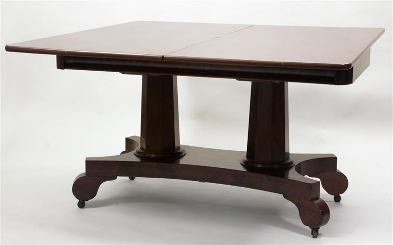 Appraisal: American Classical Mahogany Fold-Top Dining Table The swivel folding top