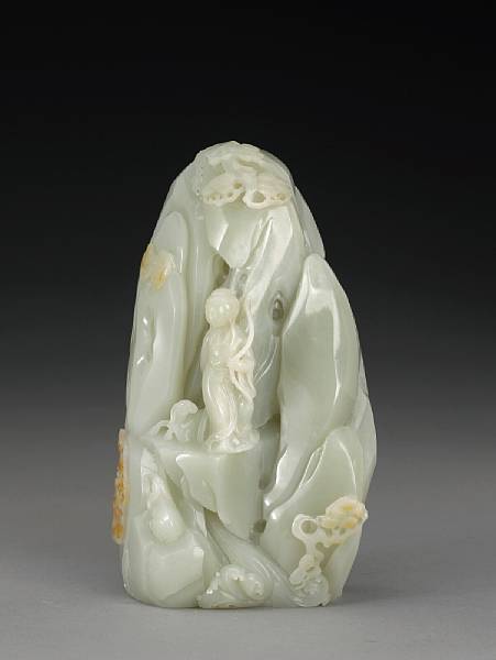 Appraisal: A carved white jade landscape rock th century The boulder